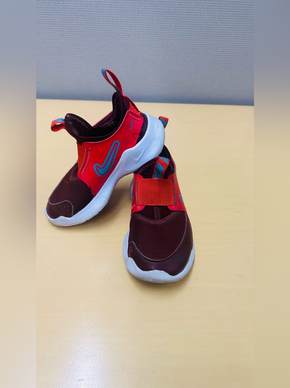 Nike Kids Slip-On Sneakers in Red and Maroon with Blue Logo